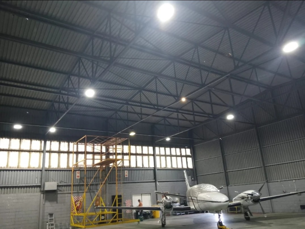 High bay lighting installed in a large hangar
