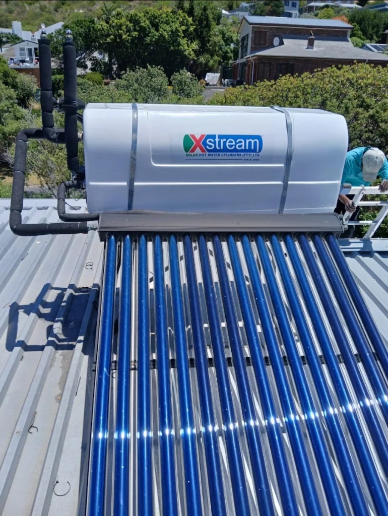 Solar geyser and panel installed on a roof